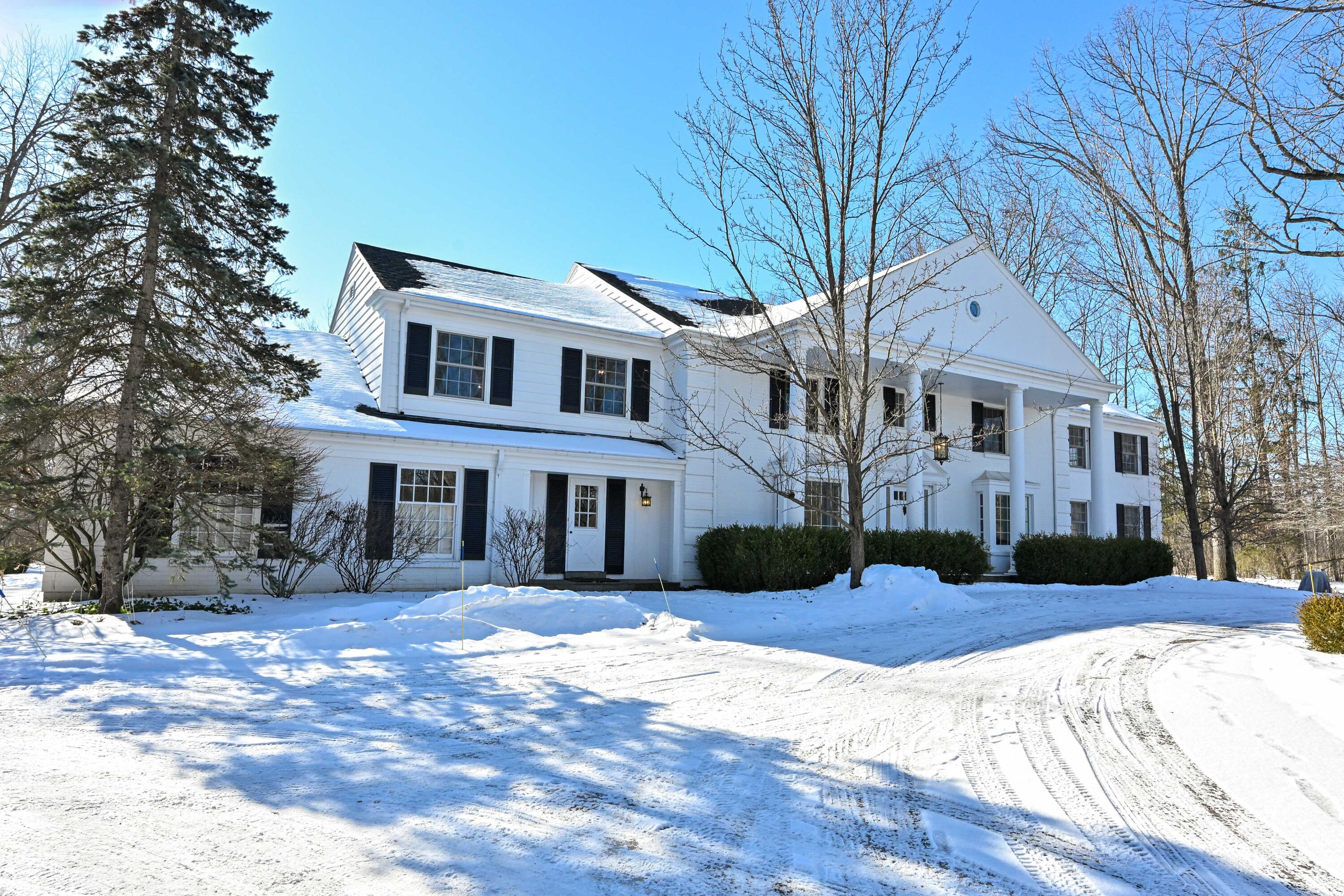 2305 West County Line Road River Hills, WI 53217 - Photo 36 of 41 Front of Home in Winter