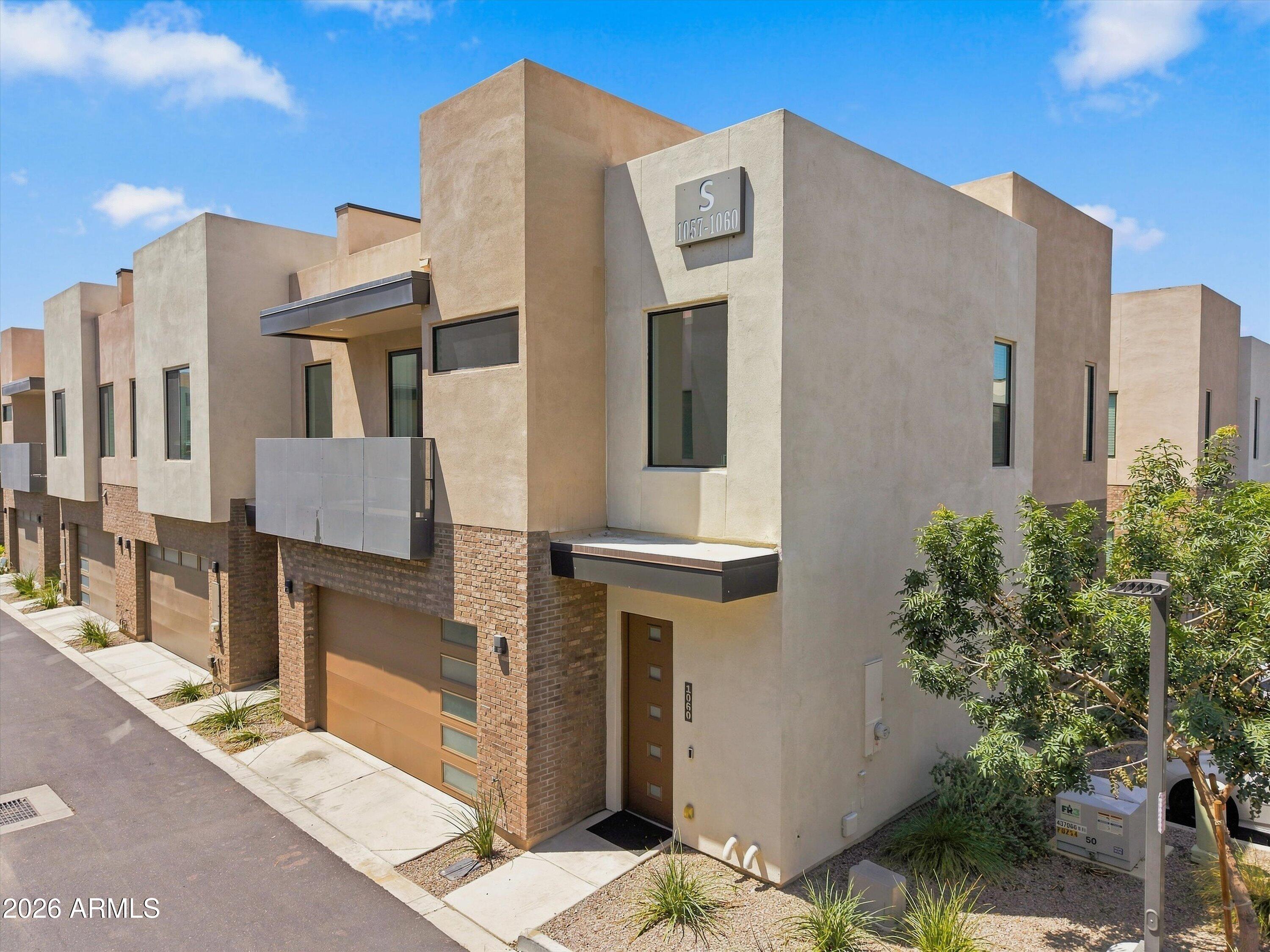 901 South Smith Road, Unit 1060 Tempe, AZ 85281 - Photo 1 of 33 Corner unit with 2 car garage
