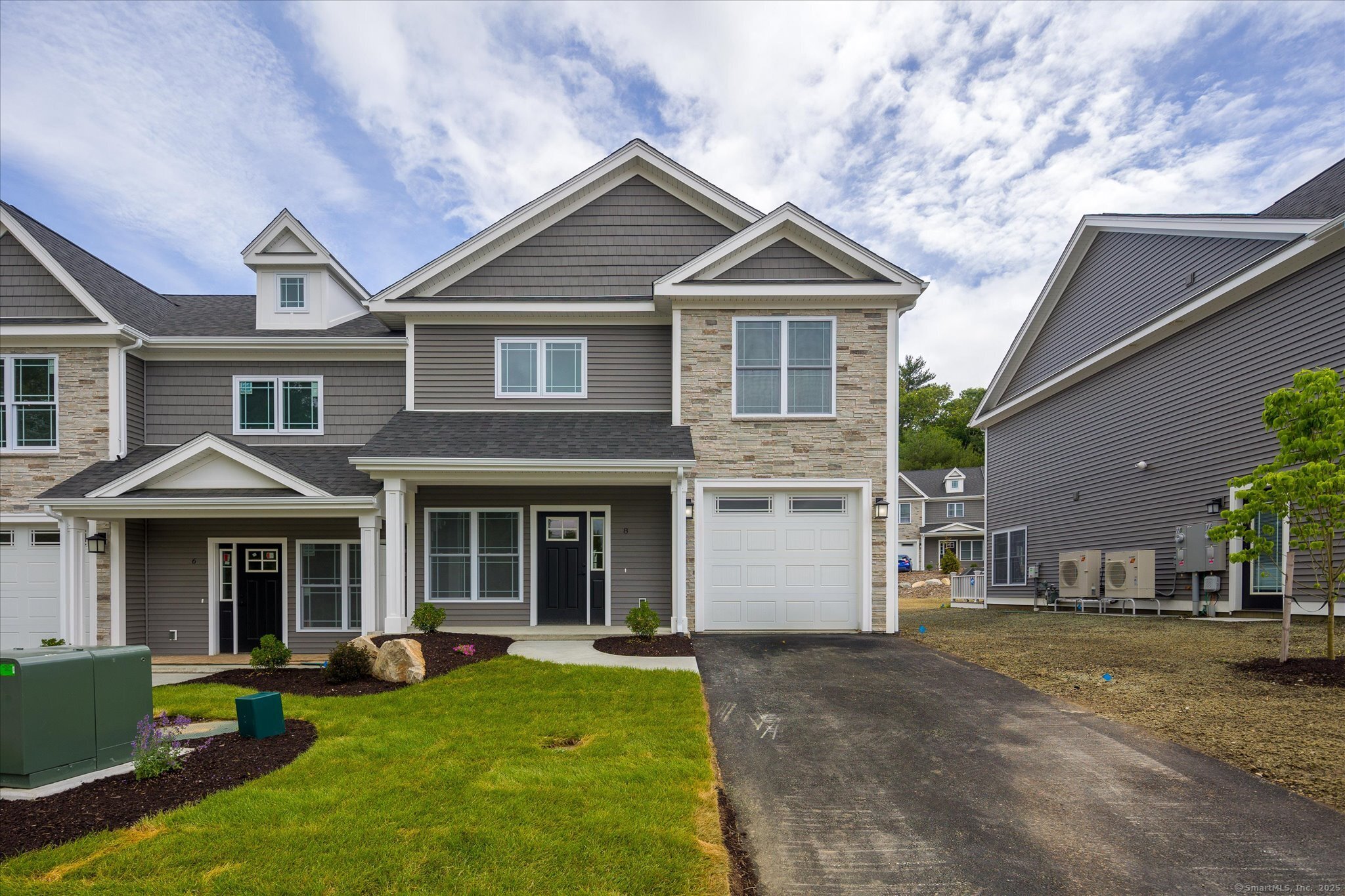 18 Valley View Drive Dayville, CT 06241 - Photo 1 of 1 a front view of a house with a yard and porch