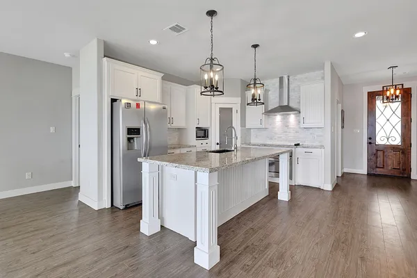 a view of a dining room with furniture