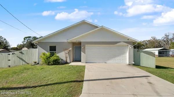 a front view of house with yard