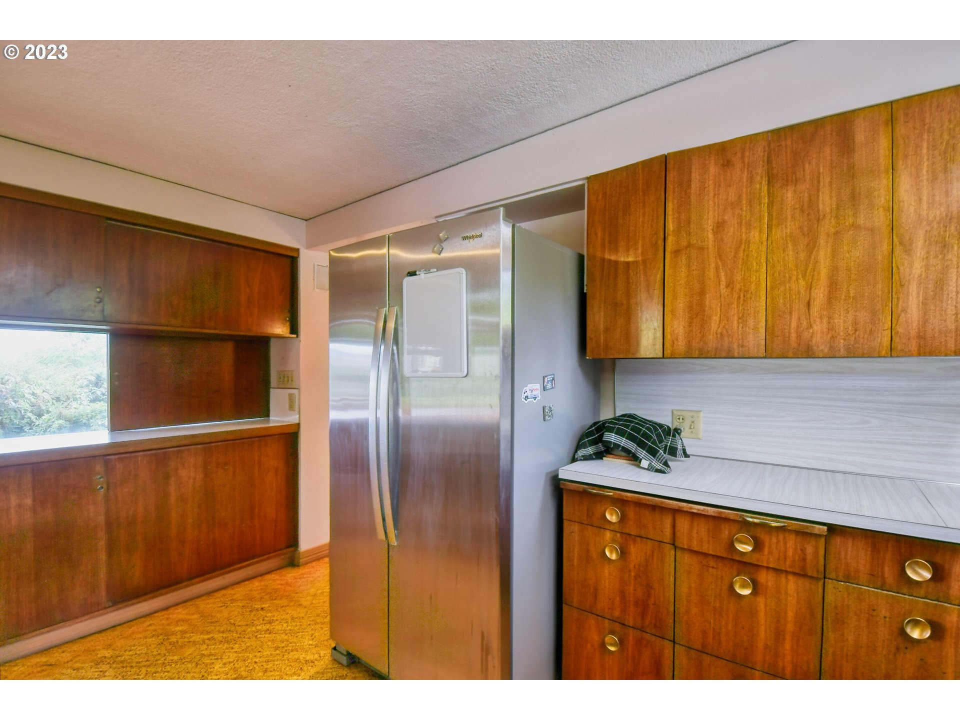 1042 Skyline Drive Pendleton, OR 97801 - Photo 12 of 48 a kitchen with stainless steel appliances granite countertop a refrigerator and a sink