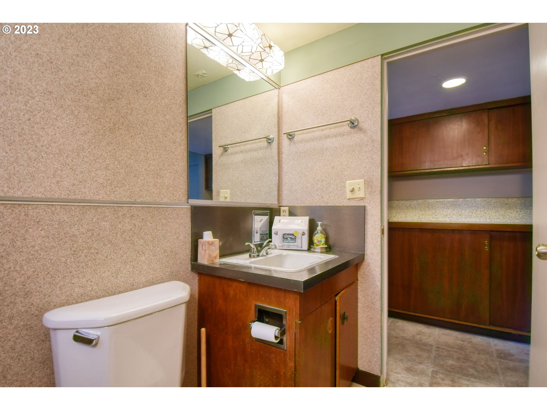 1042 Skyline Drive Pendleton, OR 97801 - Photo 21 of 48 a bathroom with a sink a mirror and a toilet
