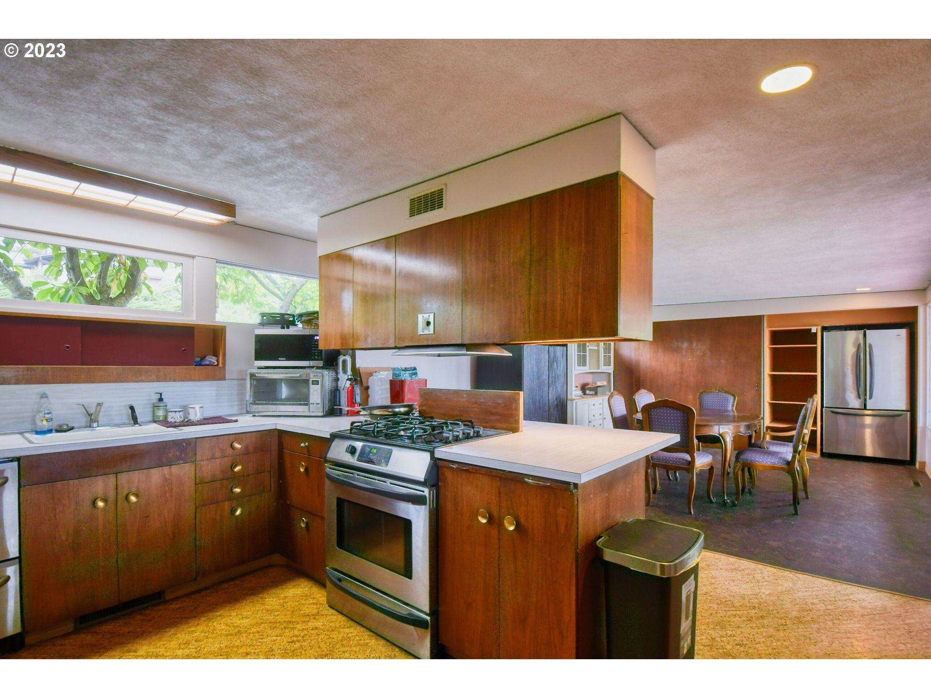 1042 Skyline Drive Pendleton, OR 97801 - Photo 10 of 48 a kitchen with a sink and cabinets