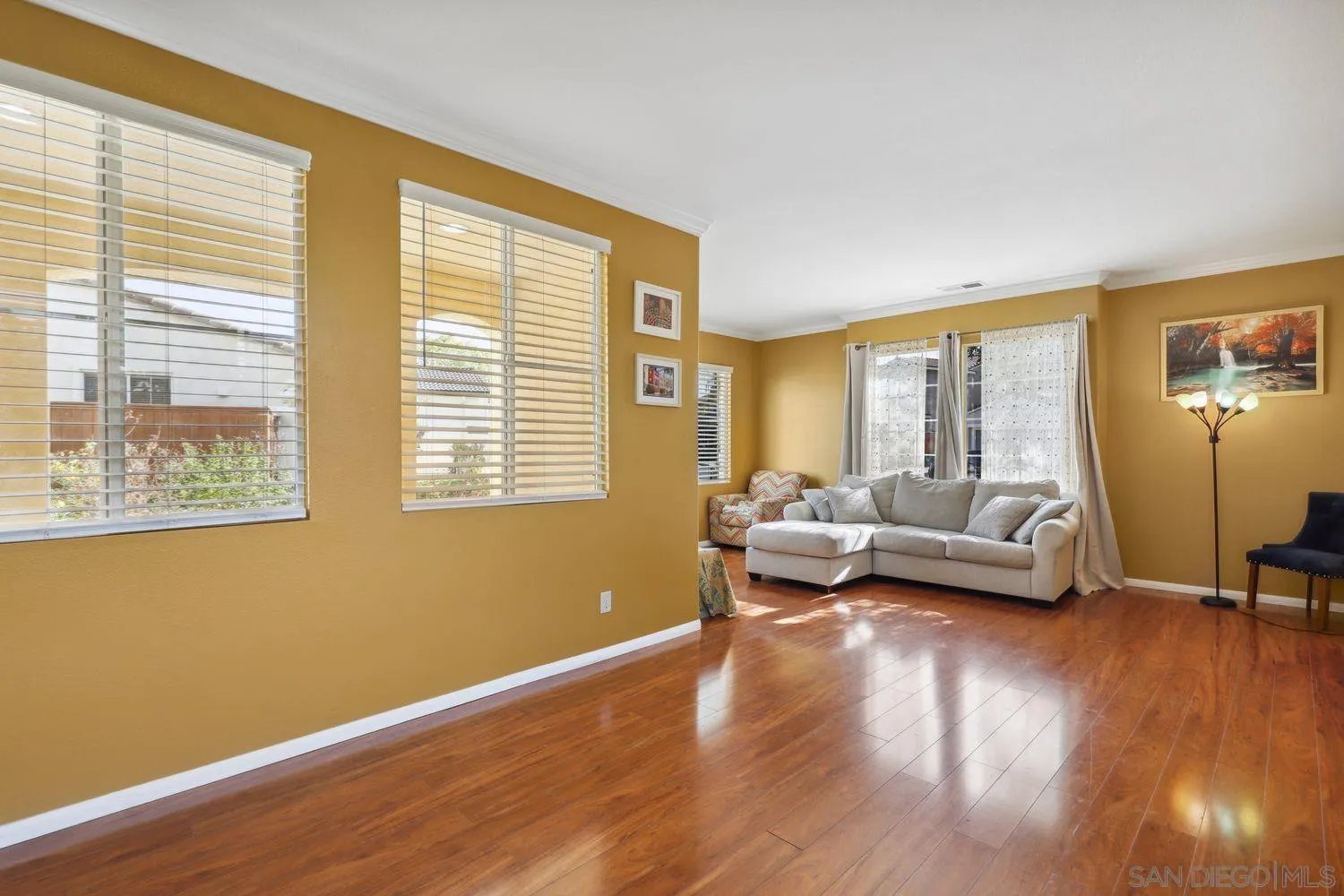1166 Midnight Way Oceanside, CA 92057 - Photo 12 of 37 a living room with furniture and a large window