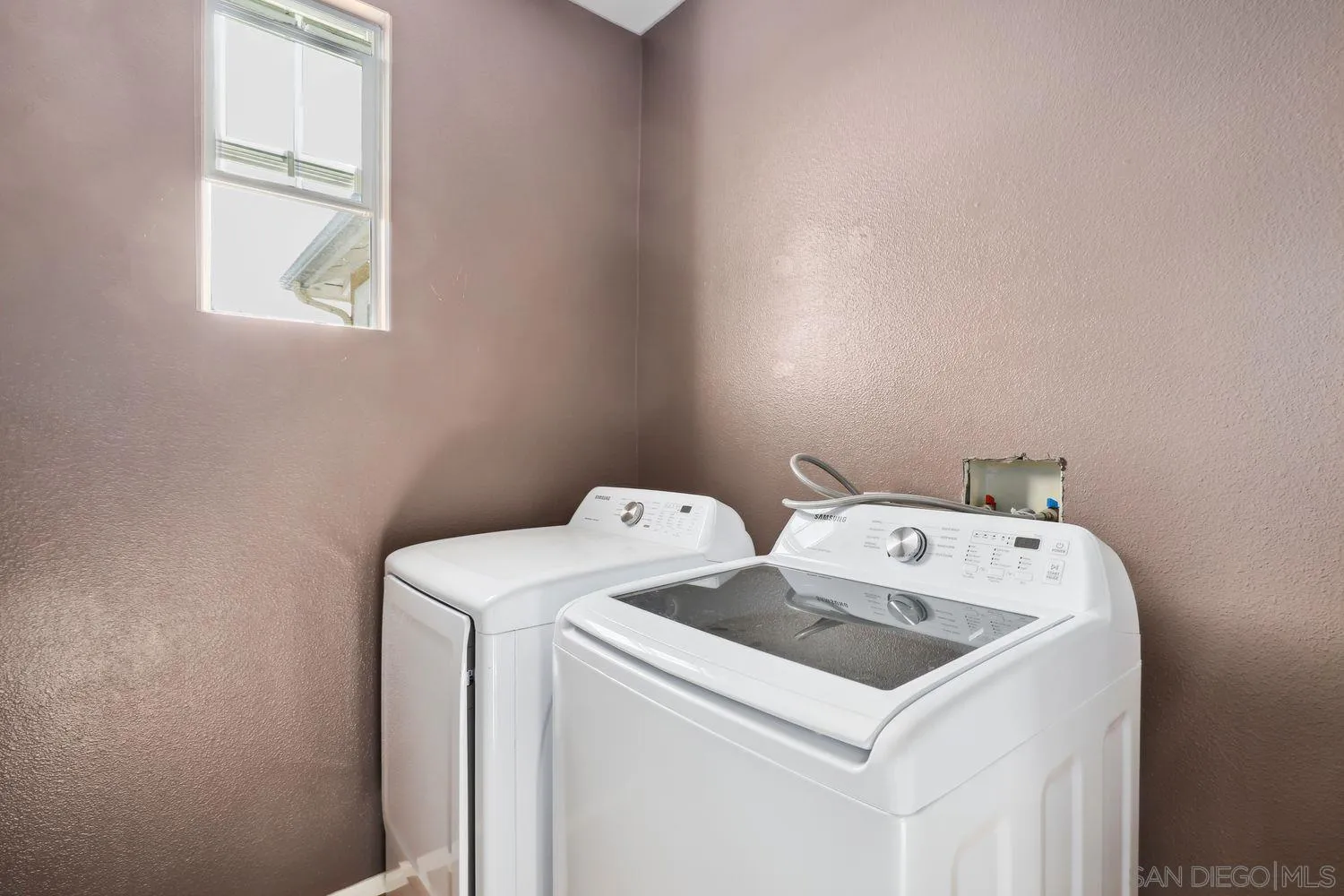 1166 Midnight Way Oceanside, CA 92057 - Photo 28 of 37 a utility room with dryer and washer