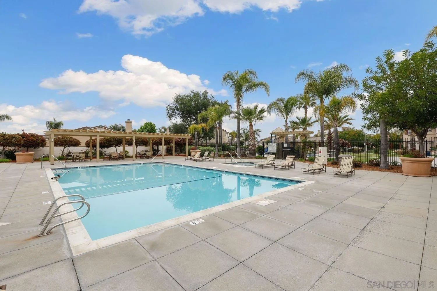 1166 Midnight Way Oceanside, CA 92057 - Photo 34 of 37 a view of swimming pool with outdoor seating and city view