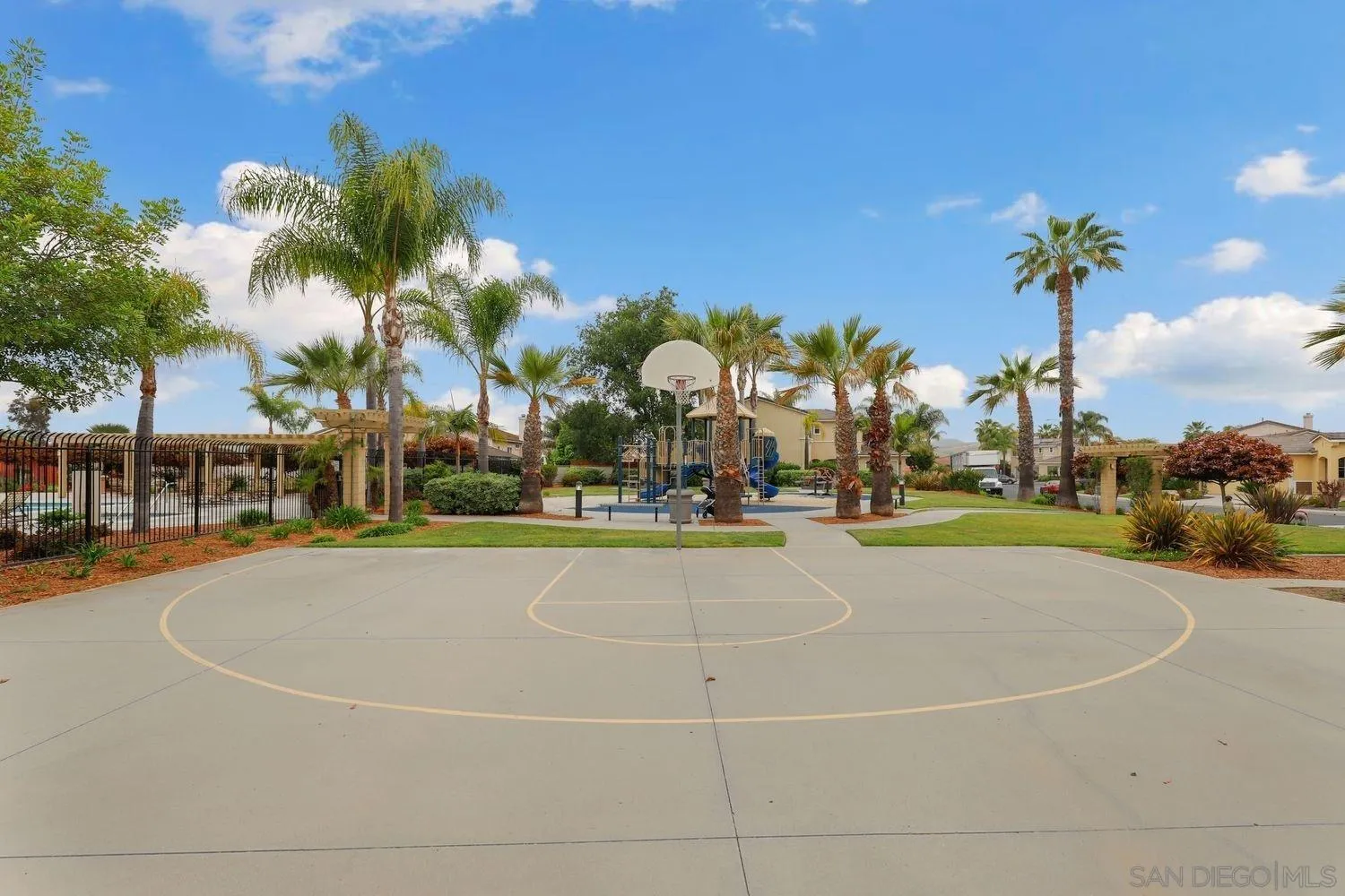 1166 Midnight Way Oceanside, CA 92057 - Photo 35 of 37 a view of a basket ball ground and palm trees