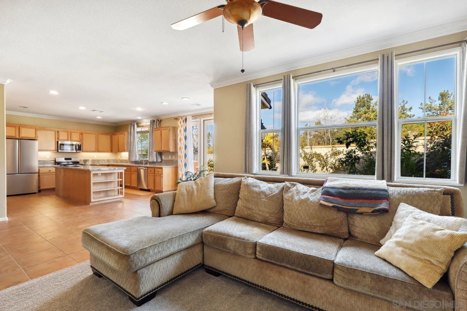1166 Midnight Way Oceanside, CA 92057 - Photo 5 of 37 a living room with furniture and a large window