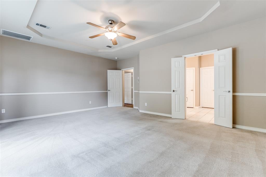 13783 Stevens Point Drive Frisco, TX 75033 - Photo 13 of 25 an empty room with closet and windows
