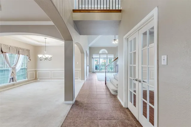 a view of a hallway with windows