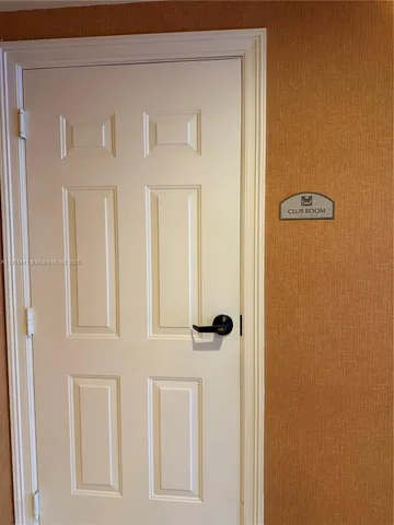 a view of swimming pool with outdoor seating and plants