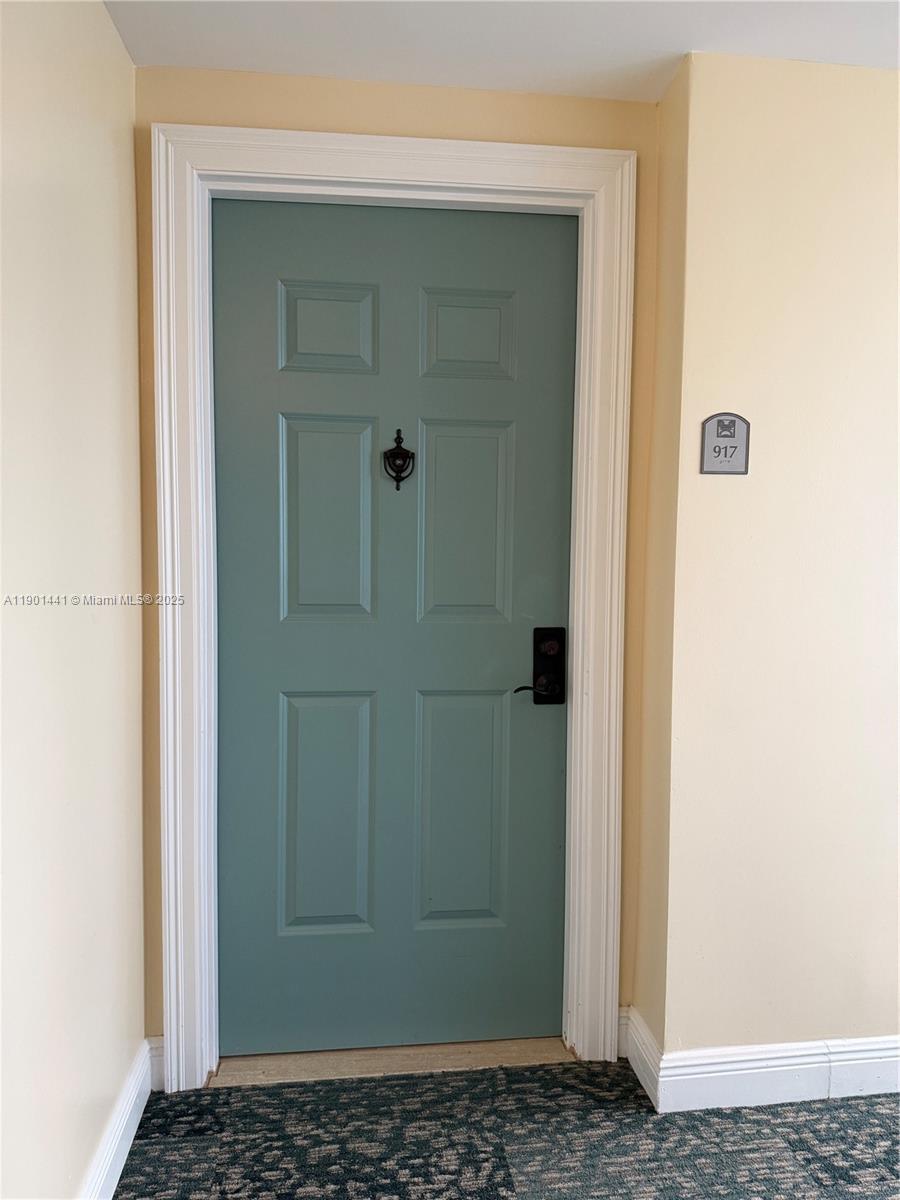 888 Douglas Road, Unit 917 Coral Gables, FL 33134 - Photo 7 of 31 a view of a wooden door