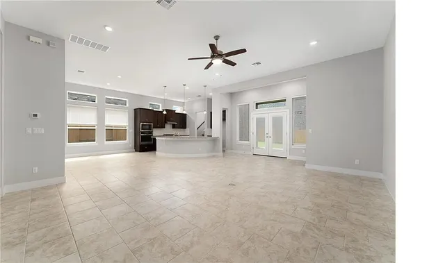 a view of a livingroom with furniture