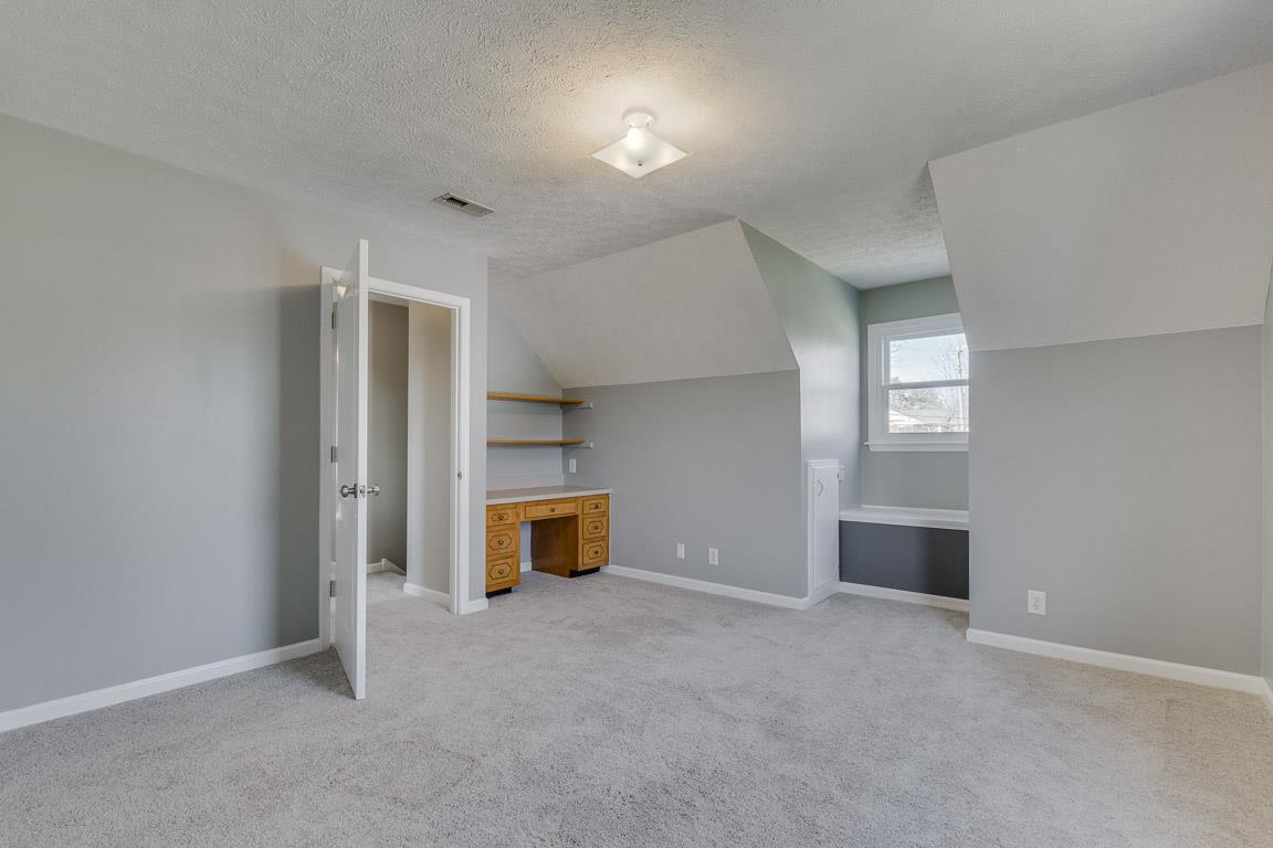 602 Luther Road Dickson, TN 37055 - Photo 19 of 26 Bedroom #2 New Carpet. Built in Desk. Additional Storage Area also.