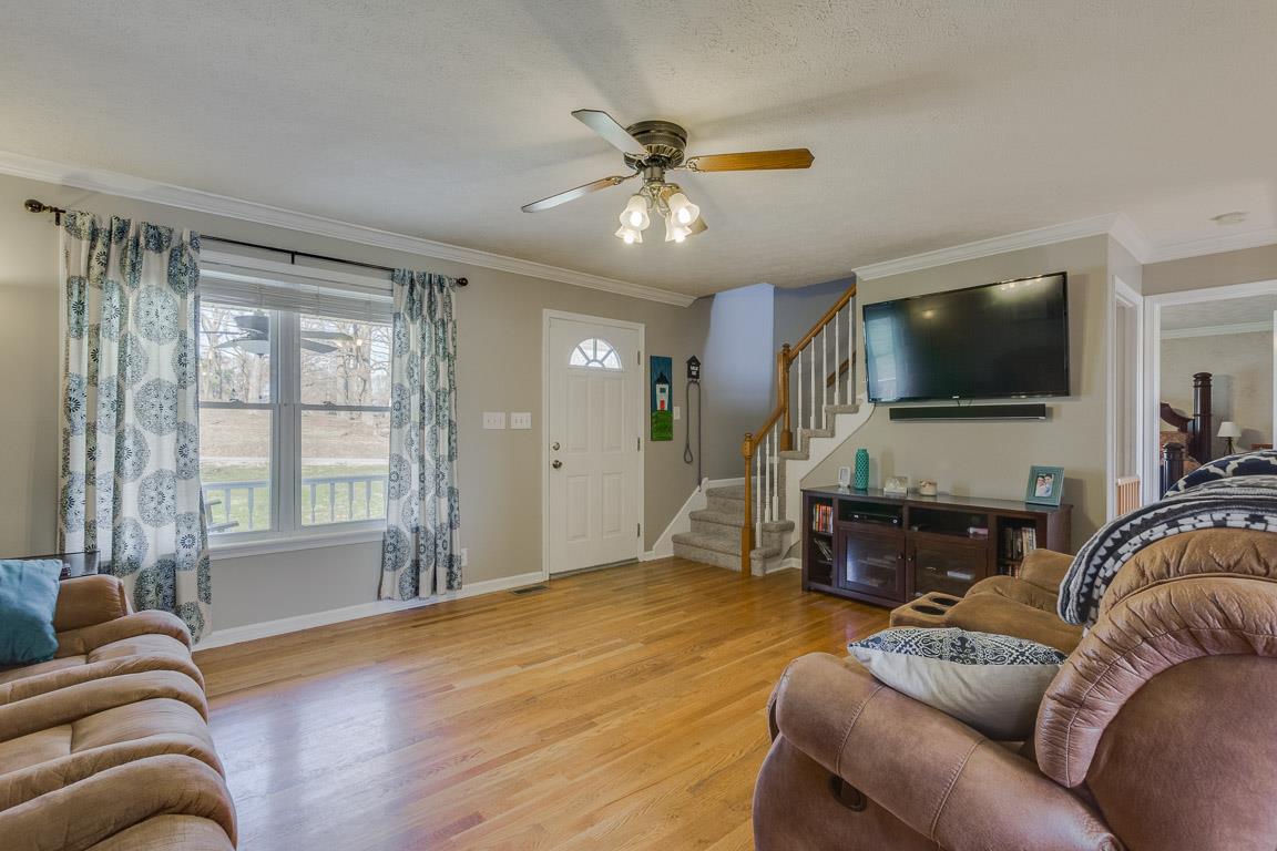 602 Luther Road Dickson, TN 37055 - Photo 4 of 26 Enter into Living Room, Gorgeous Hardwood Floors, Staircase to Upstairs Bedrooms