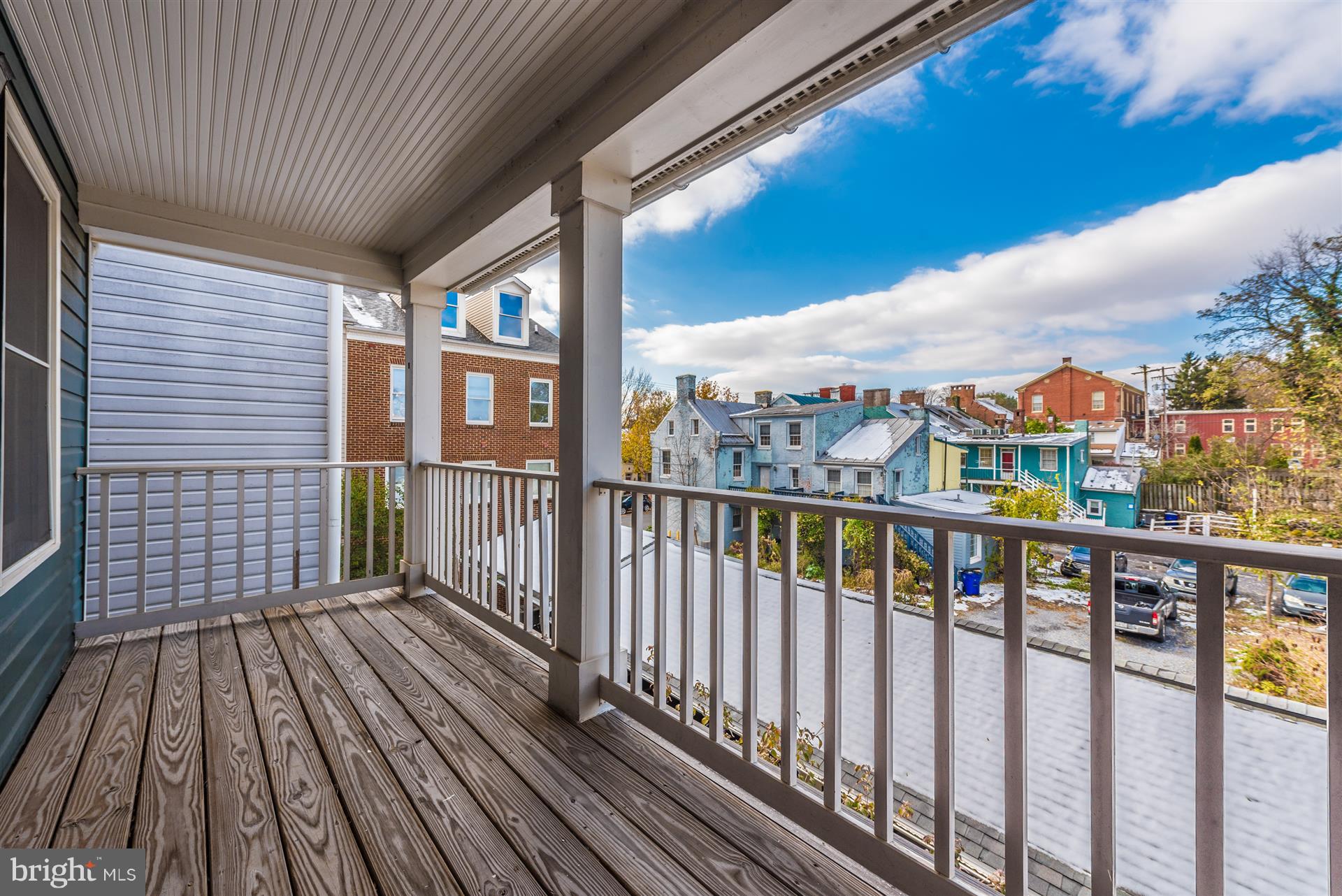 129 South Market Street Frederick, MD 21701 - Photo 17 of 37 a view of a balcony with wooden floor