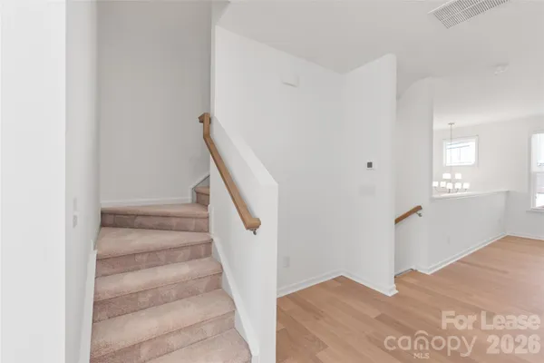 a view of a hallway with closet