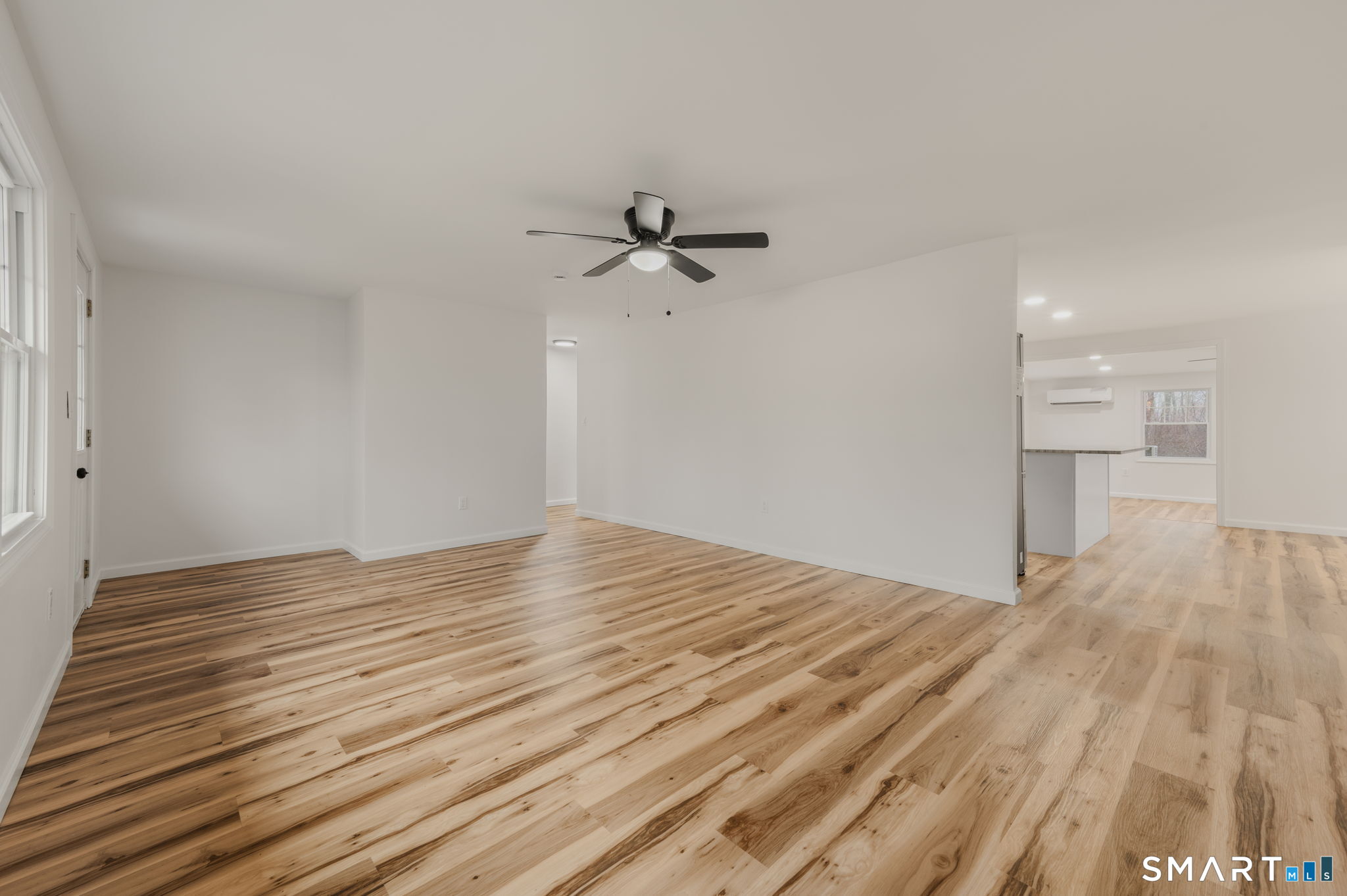 153 Meeting House Lane Ledyard, CT 06339 - Photo 11 of 39 a view of empty room with wooden floor