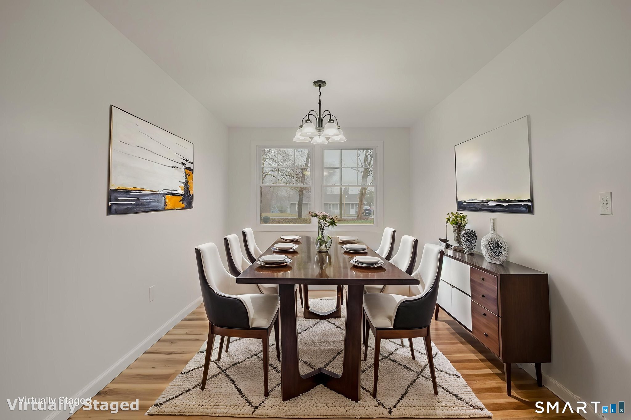 153 Meeting House Lane Ledyard, CT 06339 - Photo 17 of 39 a view of a dining room with furniture window and wooden floor