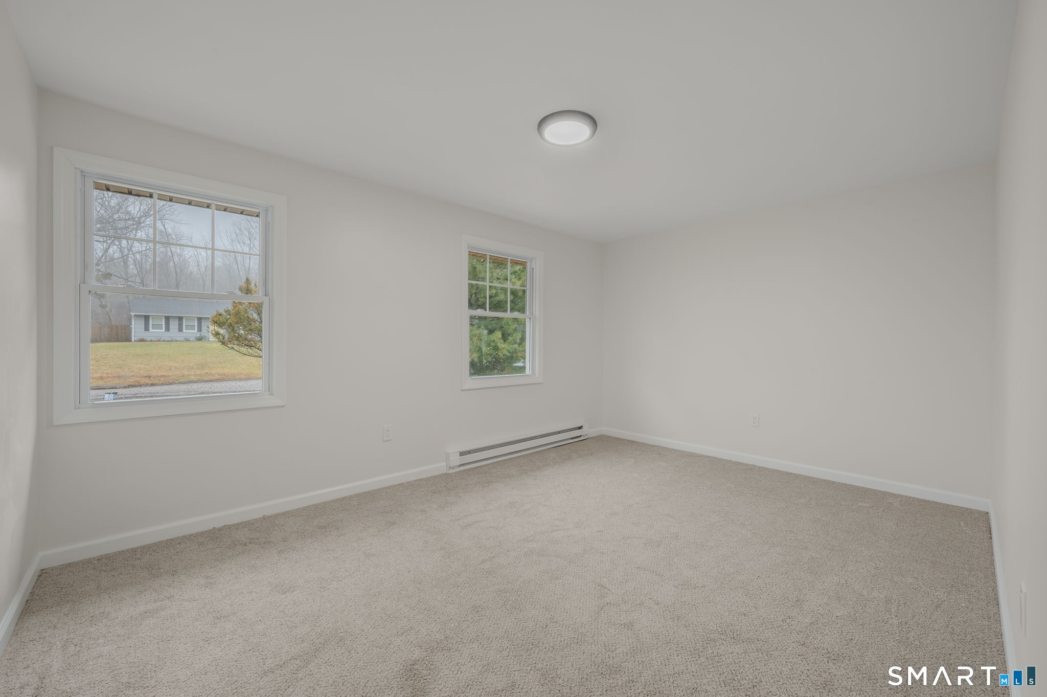 153 Meeting House Lane Ledyard, CT 06339 - Photo 25 of 39 an empty room with windows