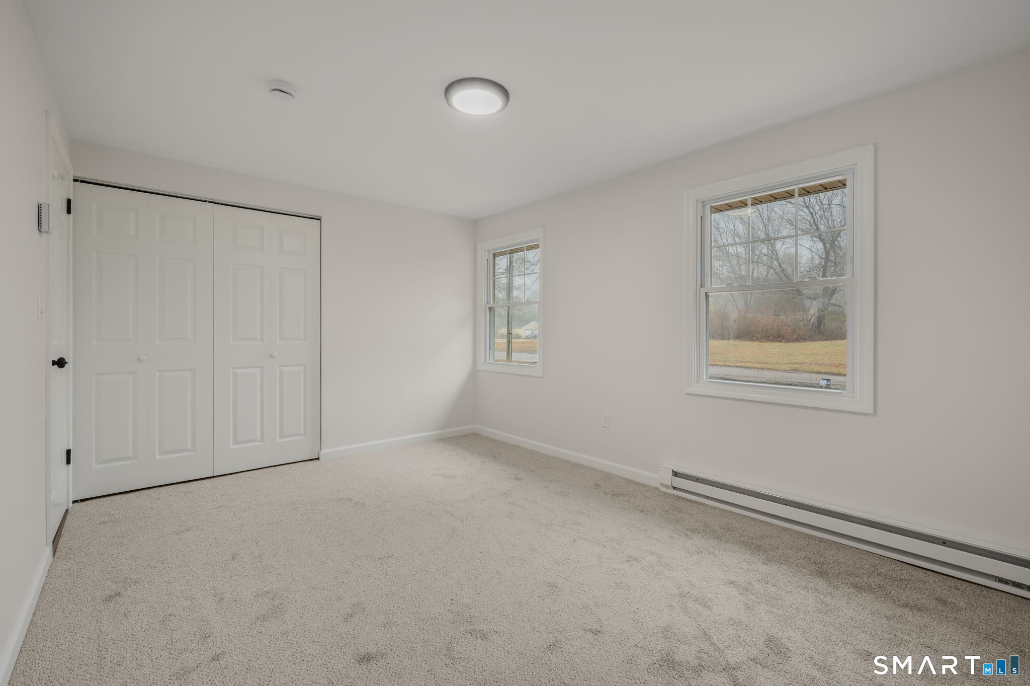 153 Meeting House Lane Ledyard, CT 06339 - Photo 28 of 39 a view of an empty room with a window
