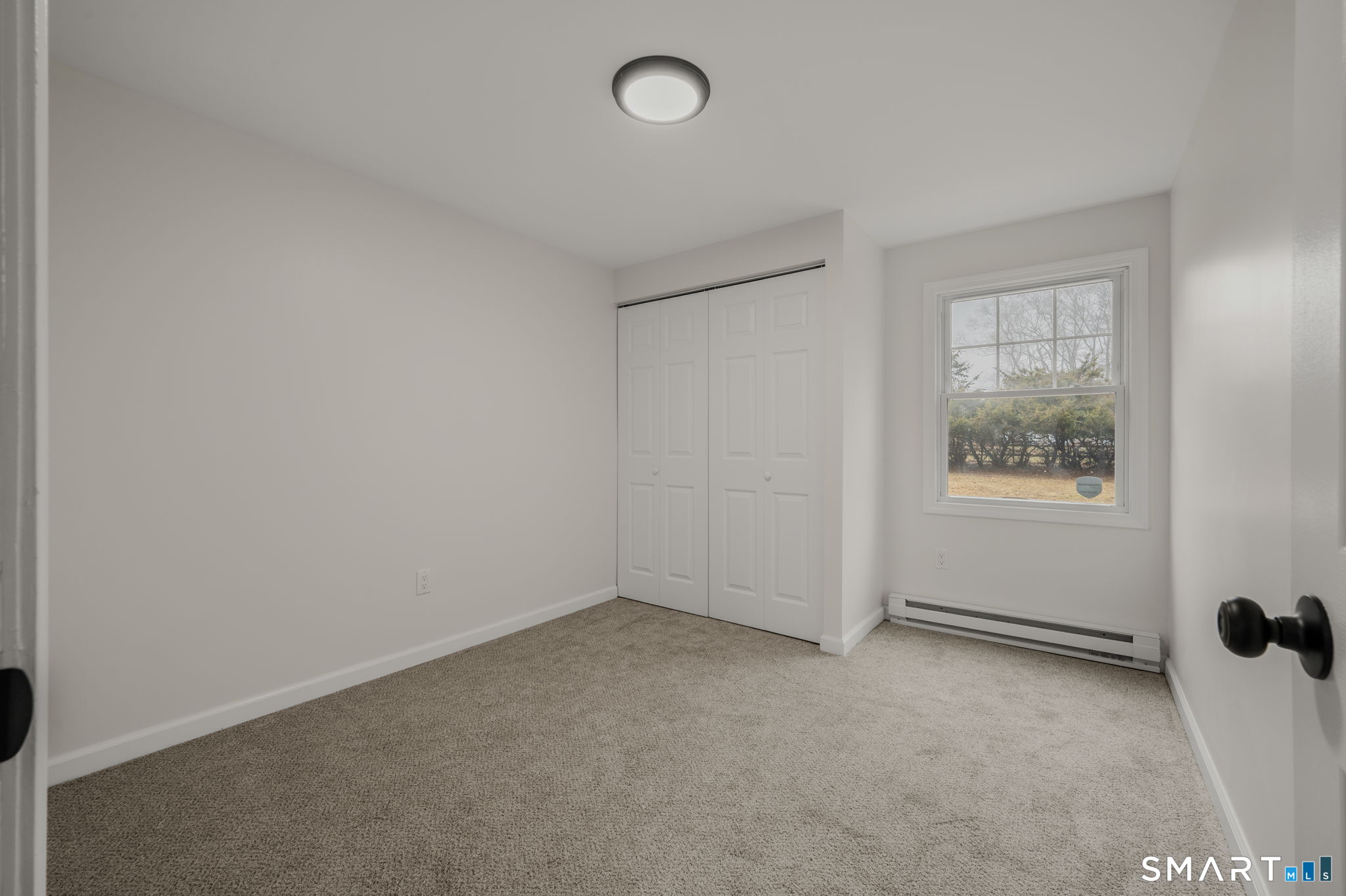 153 Meeting House Lane Ledyard, CT 06339 - Photo 30 of 39 an empty room with a window