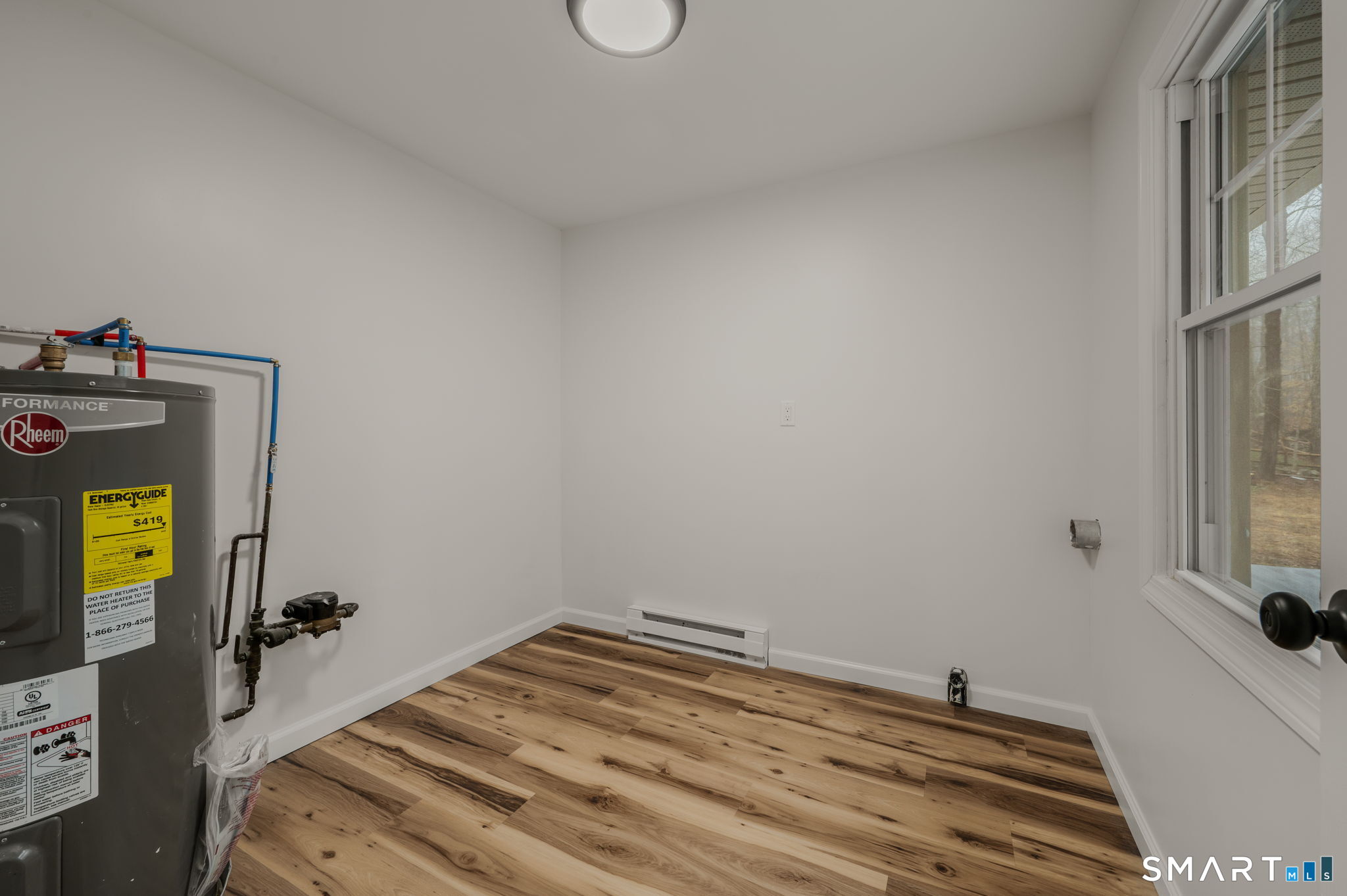 153 Meeting House Lane Ledyard, CT 06339 - Photo 35 of 39 a bathroom with a sink and a mirror