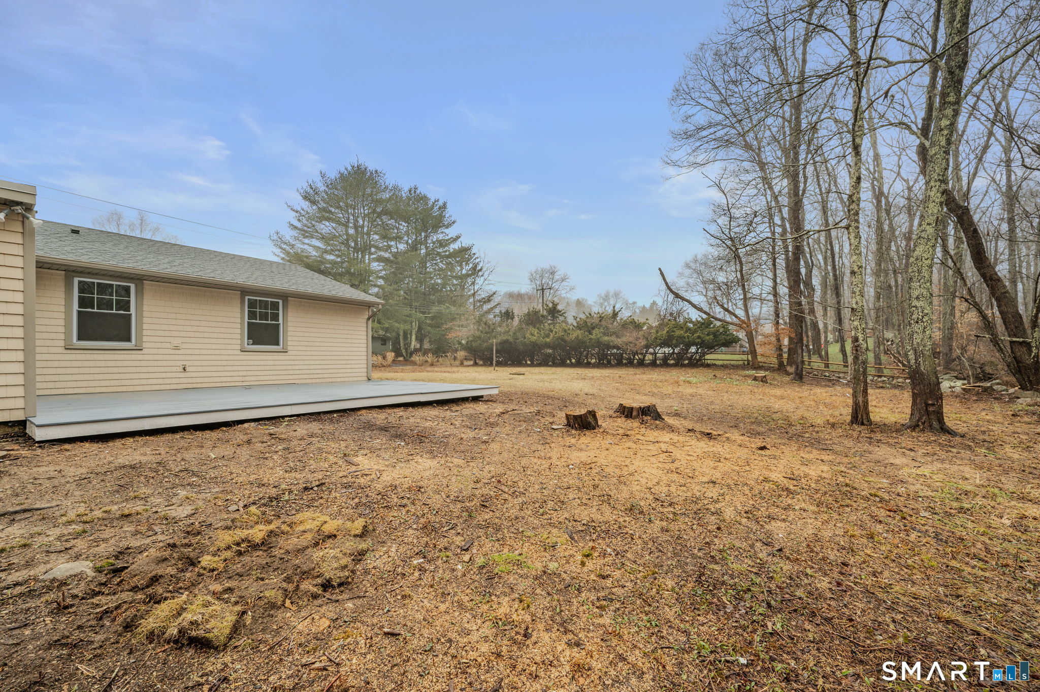 153 Meeting House Lane Ledyard, CT 06339 - Photo 4 of 39 a view of a backyard with large trees
