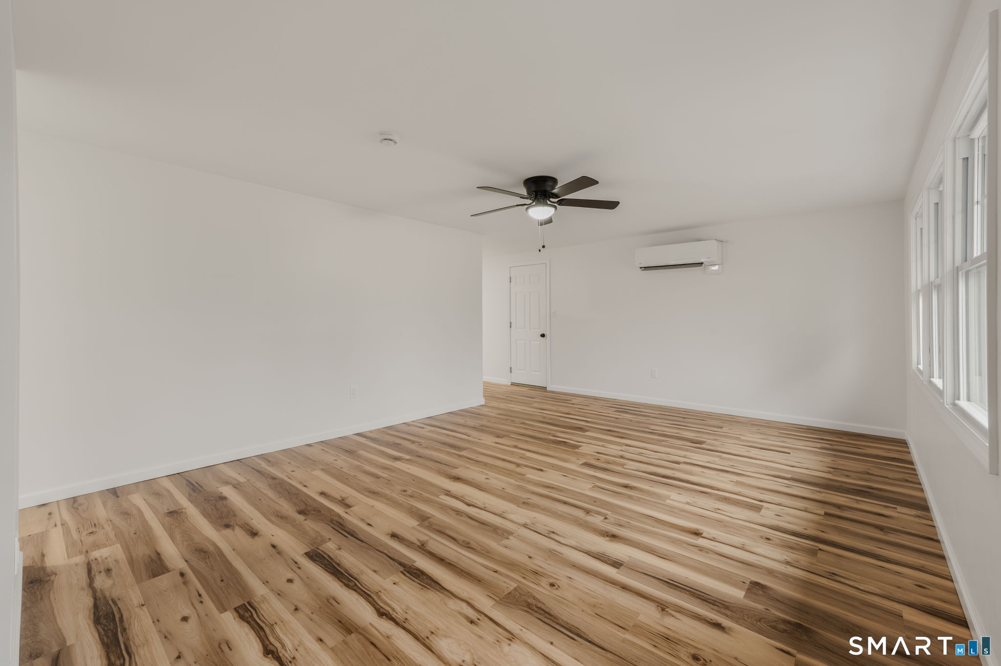 153 Meeting House Lane Ledyard, CT 06339 - Photo 8 of 39 a view of empty room with wooden floor