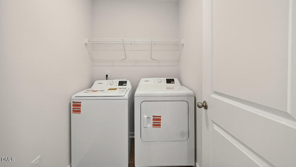 6037 Sodium Street Raleigh, NC 27610 - Photo 24 of 27 a utility room with dryer and washer