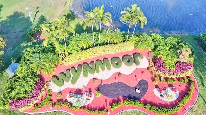 1902 Bermuda Circle, Unit G2 Coconut Creek, FL 33066 - Photo 15 of 15 a street view with flowers and flowers