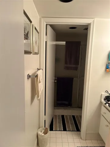 a bathroom with a sink and a shower