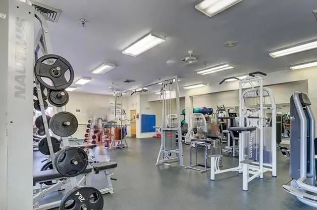 a view of a room with gym equipment