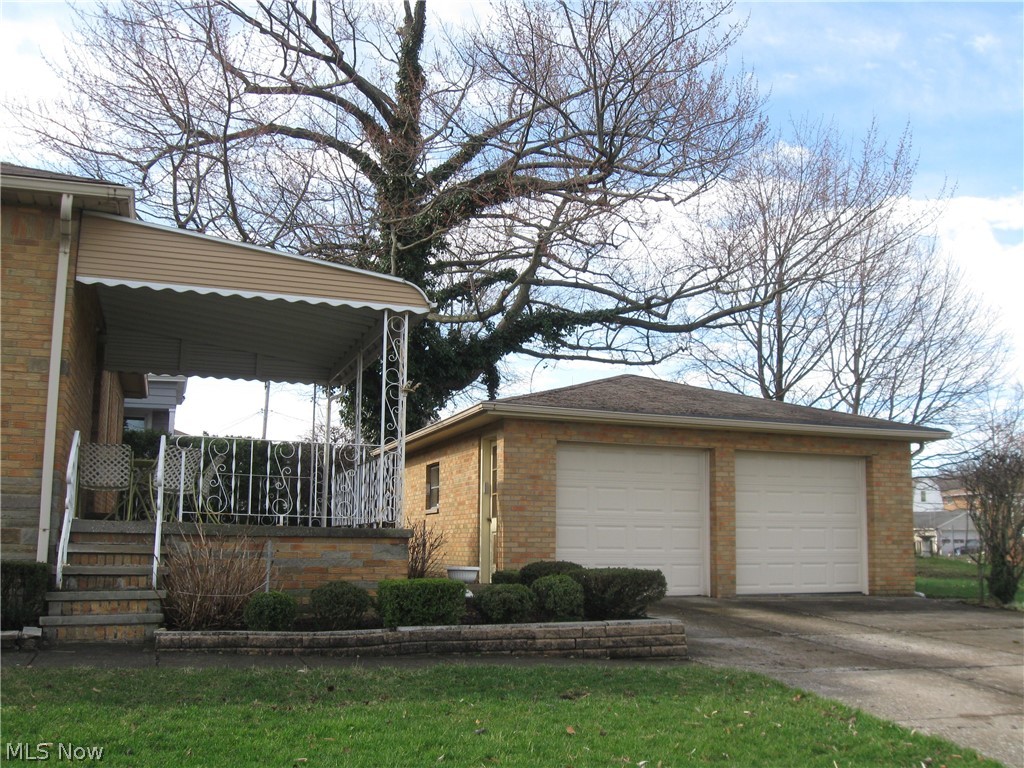 6154 State Road Parma, OH 44134 - Photo 30 of 35 Garage is very convenient to house. Behind the covered porch is a private patio.