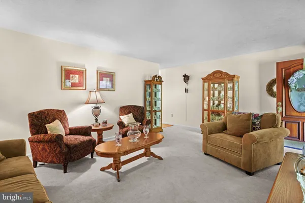 a living room with furniture and a couch