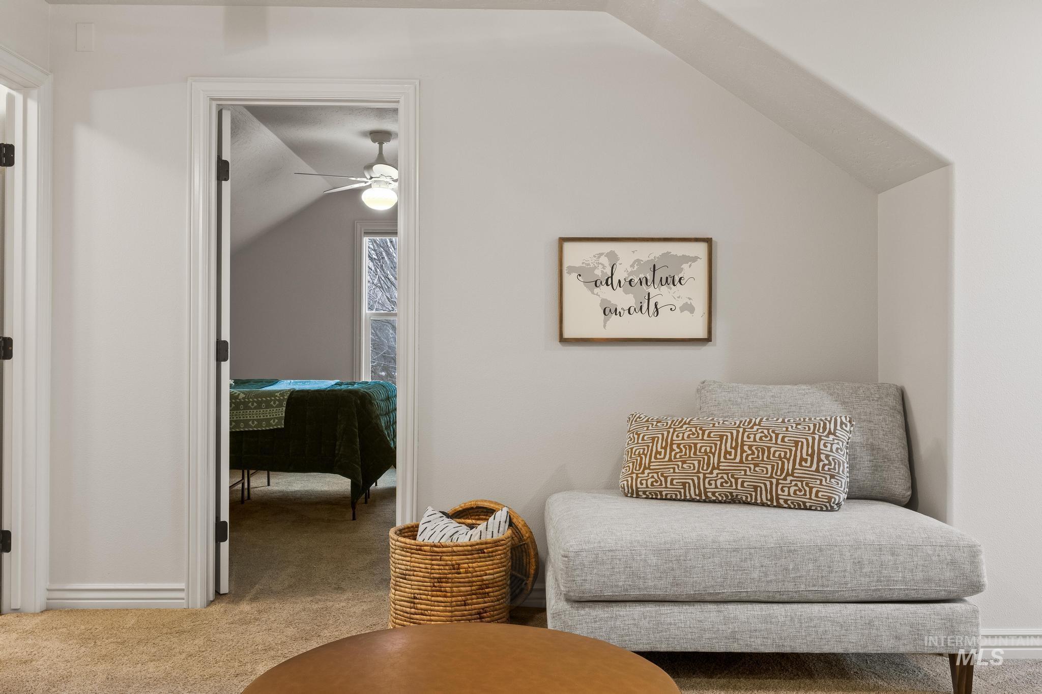2185 Waterwheel Road Emmett, ID 83617 - Photo 34 of 49 Sitting room featuring carpet flooring, vaulted ceiling, and a ceiling fan