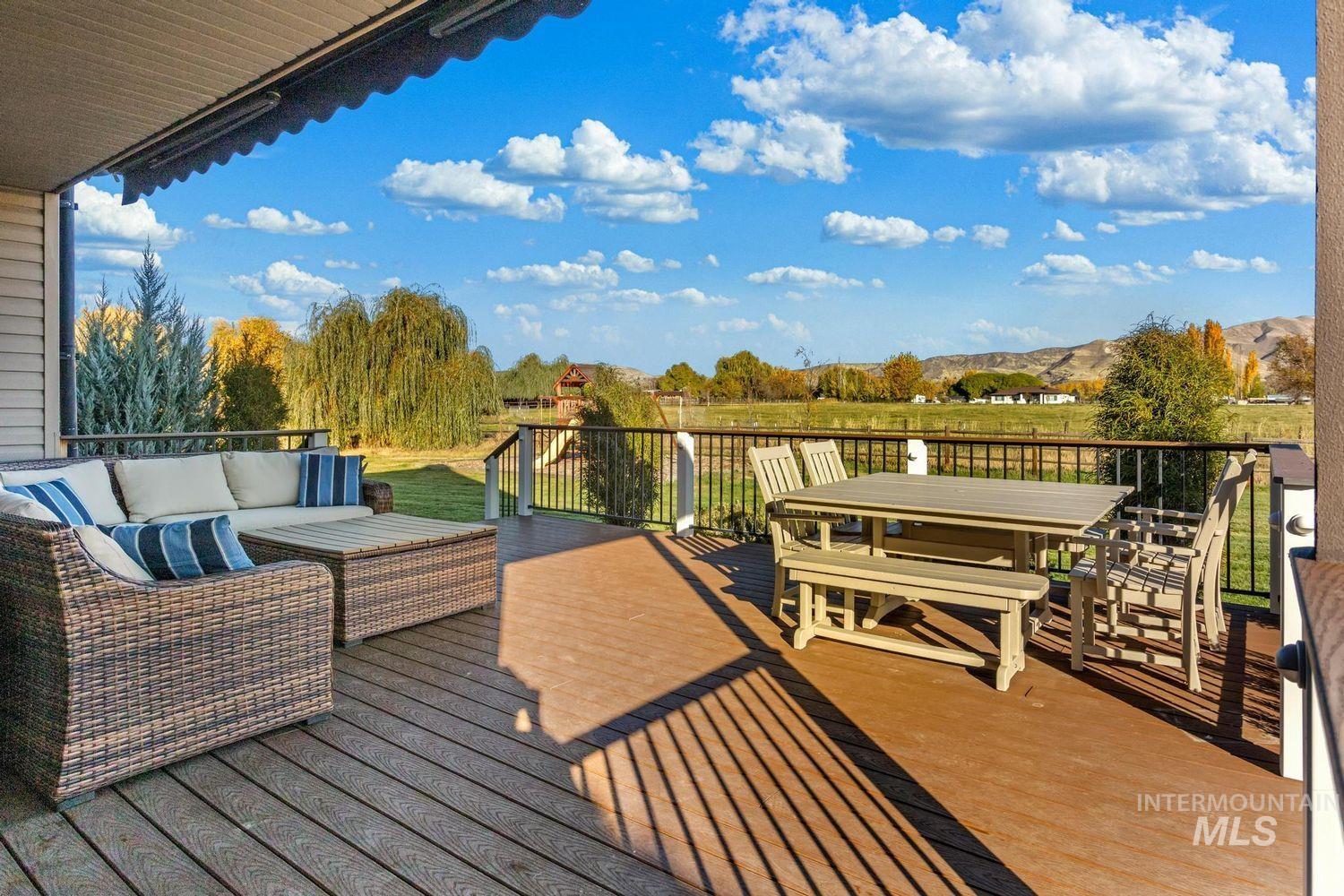 2185 Waterwheel Road Emmett, ID 83617 - Photo 40 of 49 Deck featuring an outdoor living space and outdoor dining space