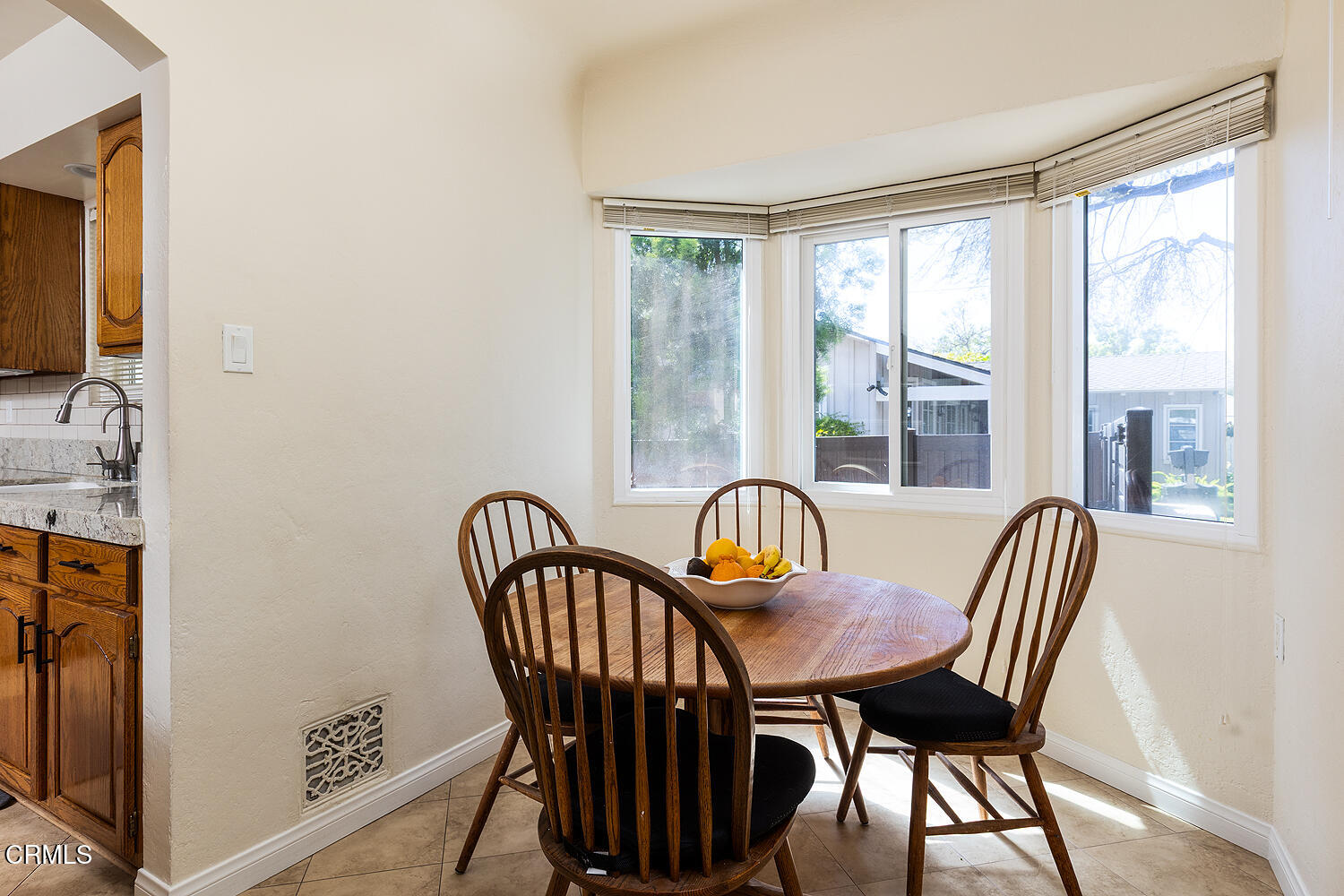 824 Palm Drive Glendale, CA 91202 - Photo 14 of 24 a view of a city from a dining room with furniture window and wooden floor