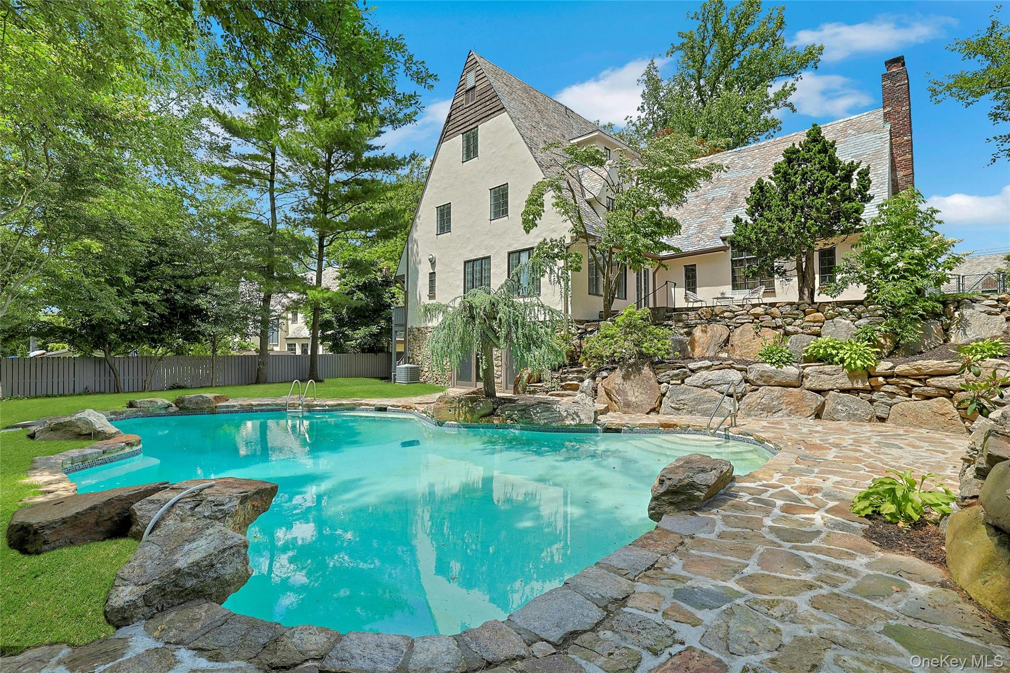 14 Withington Road Scarsdale, NY 10583 - Photo 1 of 41 a view of a house with backyard and garden