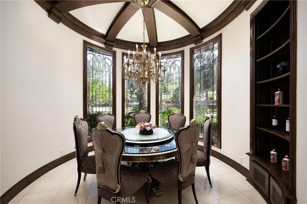 a stove top oven sitting inside of a kitchen
