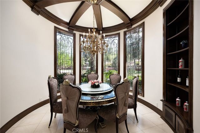 a stove top oven sitting inside of a kitchen