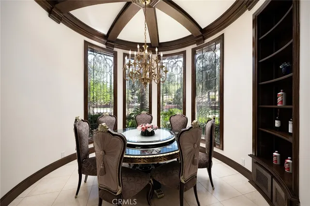 a stove top oven sitting inside of a kitchen