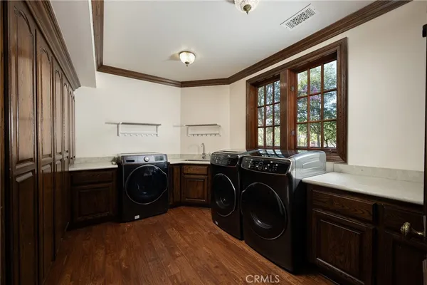 a living room with furniture or wooden floor and a fireplace