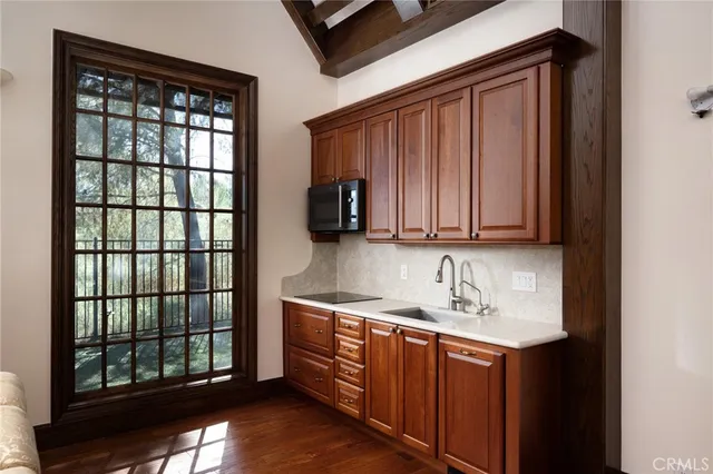 a view of a park with large trees