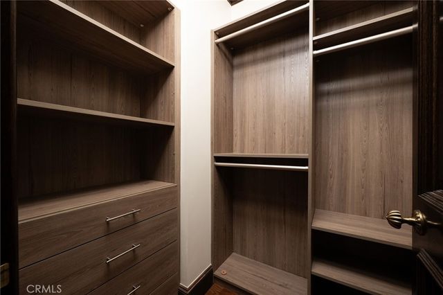 a view of a swimming pool with a yard