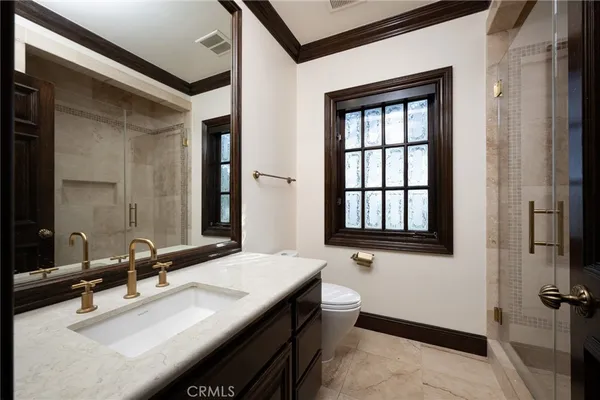 a view of a town with mountains in the background