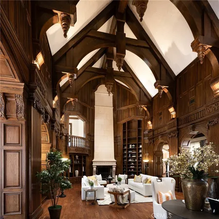 a view of a livingroom with furniture and a fireplace