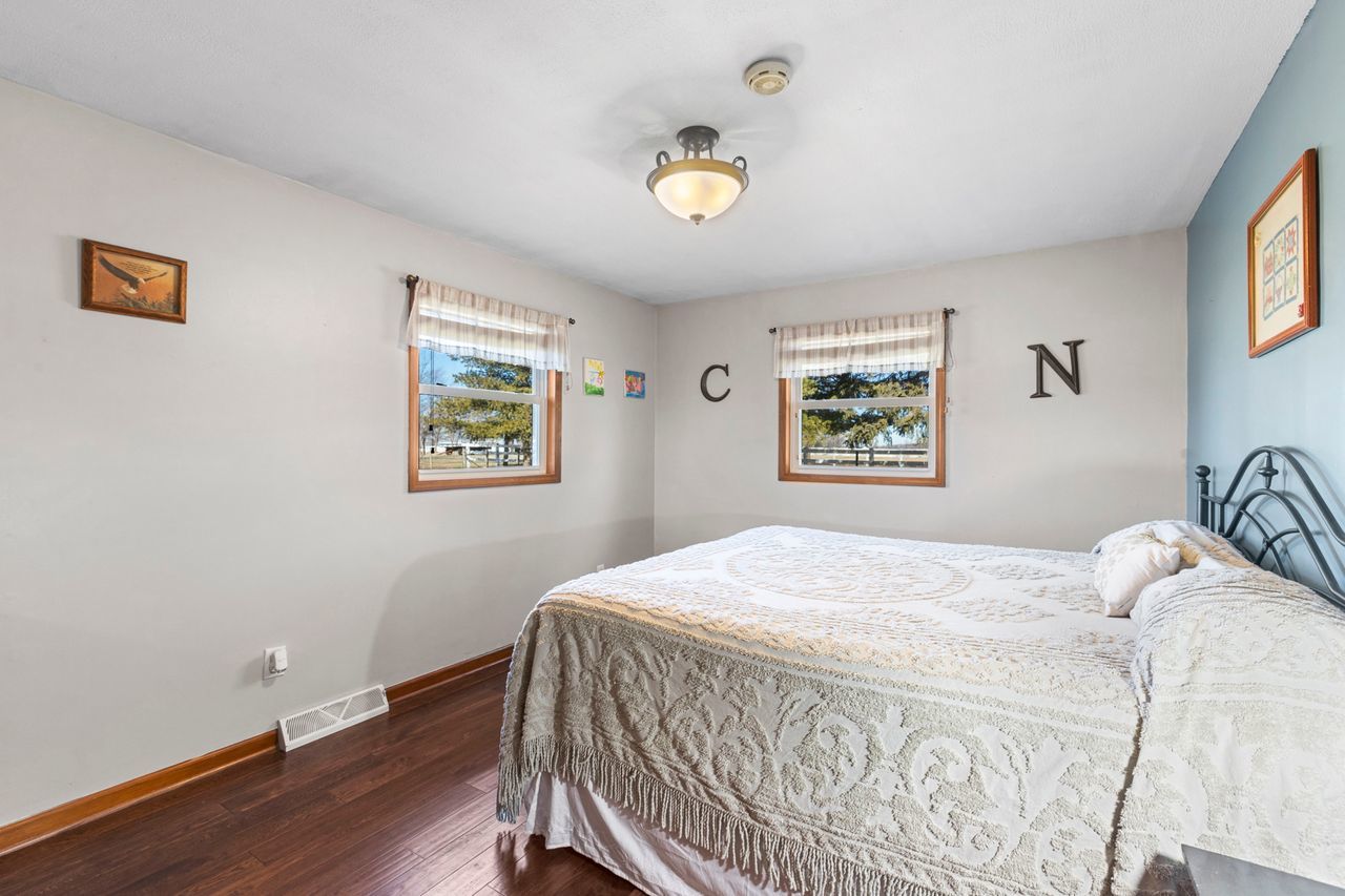 14385 Fennel Road Newark, IL 60541 - Photo 11 of 19 a bedroom with a bed and a window