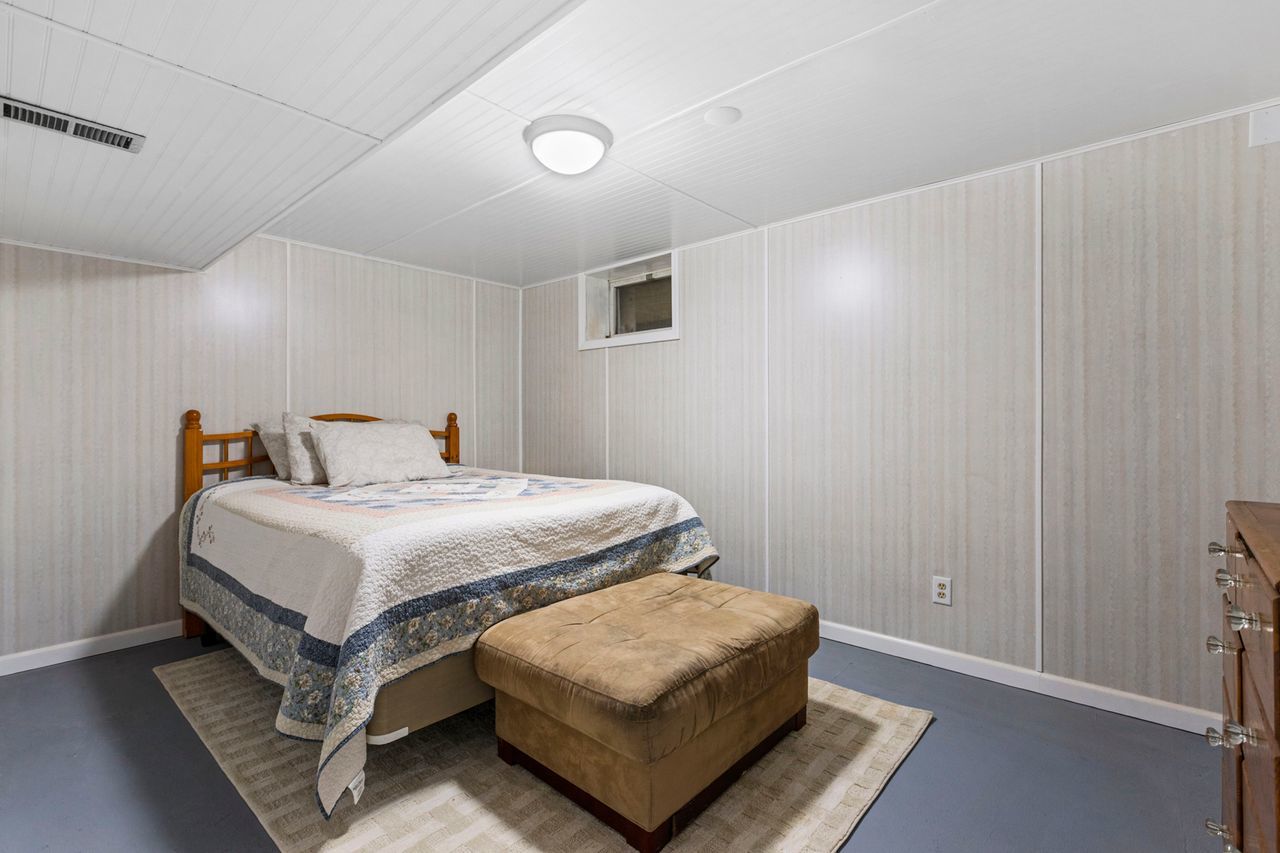 14385 Fennel Road Newark, IL 60541 - Photo 13 of 19 a bedroom with a bed and a night stand